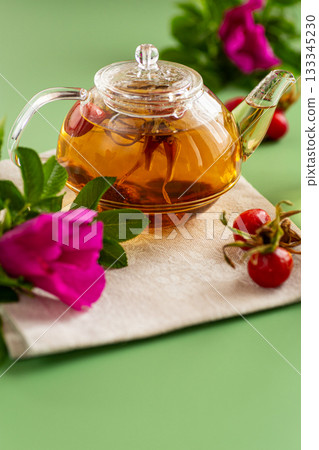 Medicinal rosehip tea with flowers and berries Medicinal rosehip tea with flowers and berries 133345230