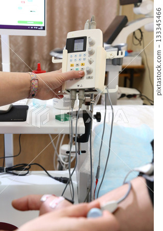 GeElectromyography. A man undergoes an examination on an electromyograph. A new field in medicine is electroneuromyography. nerated image GeElectromyography. A man undergoes an examination on an electromyograph. A new field in medicine is electroneuromyography. nerated image 133345466
