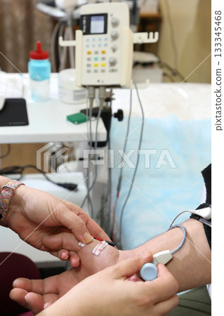 GeElectromyography. A man undergoes an examination on an electromyograph. A new field in medicine is electroneuromyography. nerated image GeElectromyography. A man undergoes an examination on an electromyograph. A new field in medicine is electroneuromyography. nerated image 133345468