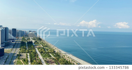 Beautiful public park, sea coast with beach and blue sky Beautiful public park, sea coast with beach and blue sky 133345786