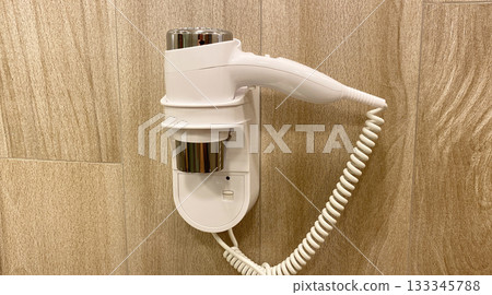hair dryer hanging on the wall hair dryer hanging on the wall 133345788