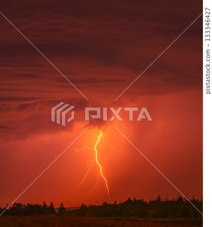 Lightning storm in the sky, lightning bolts in the storm clouds Lightning storm in the sky, lightning bolts in the storm clouds 133346427