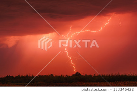 Lightning storm in the sky, lightning bolts in the storm clouds Lightning storm in the sky, lightning bolts in the storm clouds 133346428
