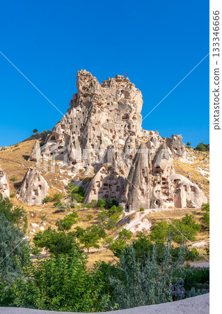 Volcanic rock formations landscape in Cappadocia, place of residence of ancient Christians Volcanic rock formations landscape in Cappadocia, place of residence of ancient Christians 133346666