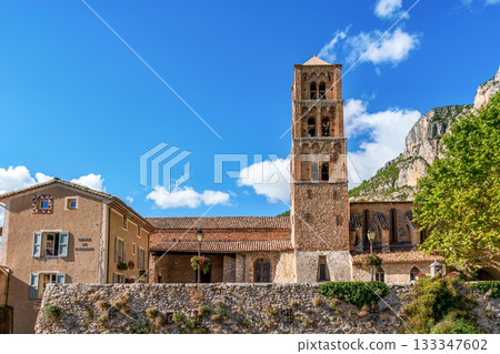The church of Notre-Dame-de-l'Assomption in Moustiers-Sainte-Marie in the Provence in southeastern France 133347602