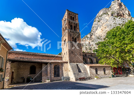 The church of Notre-Dame-de-l'Assomption in Moustiers-Sainte-Marie in the Provence in southeastern France 133347604