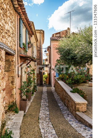 The narrow streets of the old village Moustiers Sainte Marie in France 133347606