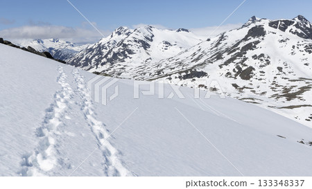 Footprints in pristine snow reveal recent exploration in Leirdalen's stunning snowy landscape 133348337