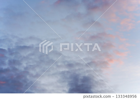 Evening sky with some pink and dark clouds - blue hour background 133348956