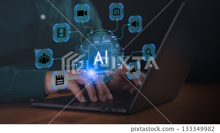 Hands typing on laptop with glowing AI technology icons for video, camera, sound, search, and communication, representing artificial intelligence, machine learning, digital media, and innovation. Hands typing on laptop with glowing AI technology icons for video, camera, sound, search, and communication, representing artificial intelligence, machine learning, digital media, and innovation. 133349982