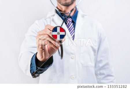 Dominican Republic healthcare system, doctor holding stethoscope. Dominican Republic health and medical insurance concept Dominican Republic healthcare system, doctor holding stethoscope. Dominican Republic health and medical insurance concept 133351282
