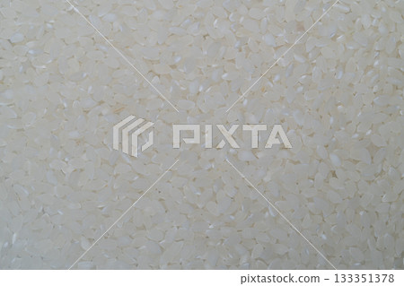 Close-up of white rice texture background Close-up of white rice texture background 133351378