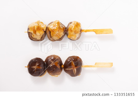 Shiitake mushroom meatballs and grilled skewers 133351655