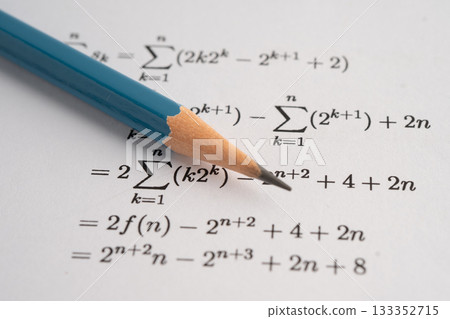 Pencil on mathematic formula exercise test paper in education school. 133352715