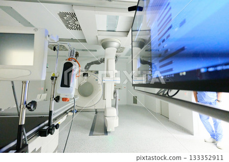 Modern medical imaging room with advanced technology and equipment in a hospital setting 133352911