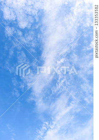 beautiful blue sky and white fluffy group of clouds with sunrise in the morning, natural background beautiful blue sky and white fluffy group of clouds with sunrise in the morning, natural background 133353582