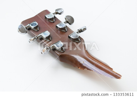 part of broken wood acoustic guitar isolated on white background 133353611