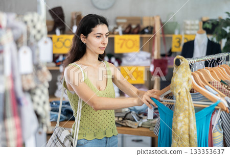 Armenian woman chooses a summer dress on sale Armenian woman chooses a summer dress on sale 133353637