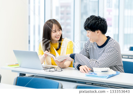 College students taking classes in the classroom 133353643