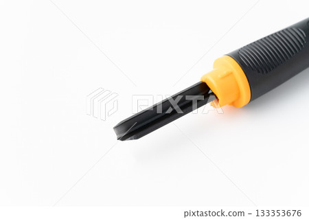 Close-up of the cutting edge of a triangular carving knife on a white background Close-up of the cutting edge of a triangular carving knife on a white background 133353676