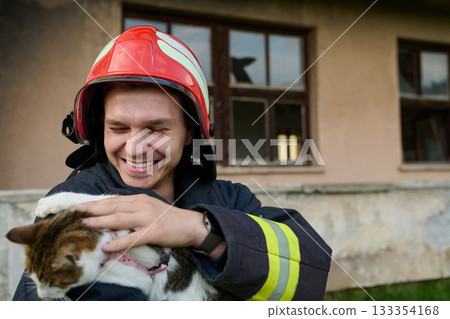 Firefighter rescues cat from burning building, a hero in action, saving a pet, wearing a helmet, outdoor scene, building damage, rescue operation, brave man, animal care Firefighter rescues cat from burning building, a hero in action, saving a pet, wearing a helmet, outdoor scene, building damage, rescue operation, brave man, animal care 133354168