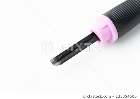 Close-up of the cutting edge of a carving knife (small round knife) on a white background 133354506