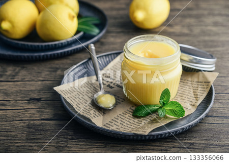 Homemade lemon curd in a glass jar Homemade lemon curd in a glass jar 133356066