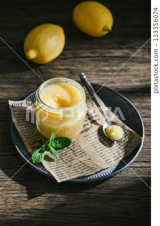 Homemade lemon curd in a glass jar Homemade lemon curd in a glass jar 133356074