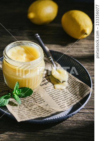 Homemade lemon curd in a glass jar 133356077