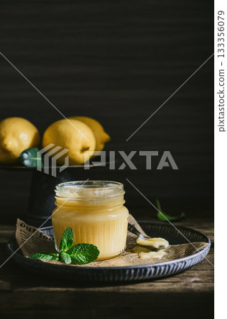 Homemade lemon curd in a glass jar Homemade lemon curd in a glass jar 133356079