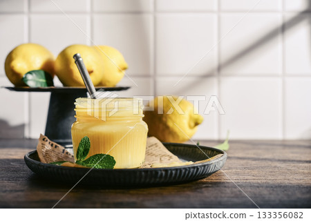 Homemade lemon curd in a glass jar Homemade lemon curd in a glass jar 133356082