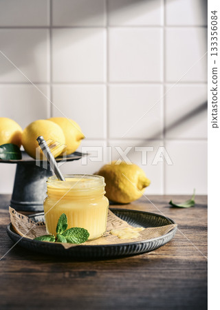 Homemade lemon curd in a glass jar Homemade lemon curd in a glass jar 133356084