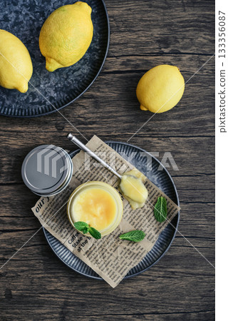 Homemade lemon curd in a glass jar Homemade lemon curd in a glass jar 133356087