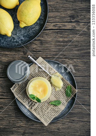 Homemade lemon curd in a glass jar Homemade lemon curd in a glass jar 133356088