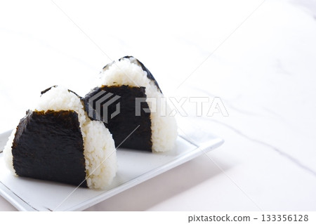Onigiri - Delicious rice balls made with freshly cooked rice Onigiri - Delicious rice balls made with freshly cooked rice 133356128