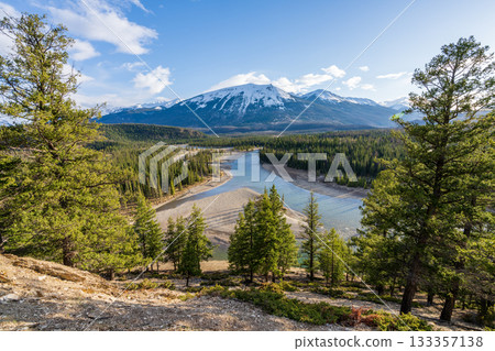 Landscape background of Jasper National Park, Canadian Rockies. Nature of Athabasca River and Whistlers Mountain in late spring and early summer Landscape background of Jasper National Park, Canadian Rockies. Nature of Athabasca River and Whistlers Mountain in late spring and early summer 133357138