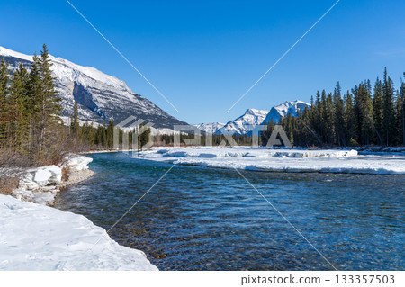 Bow River and Mount Rundle in winter. Canmore, Alberta, Canada 133357503