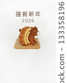 New Year's card 2 of a horse buried in a rolled sushi roll with a greeting and the year 133358196
