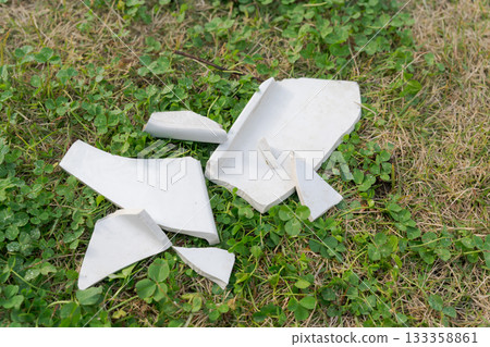 Broken pottery shards 133358861