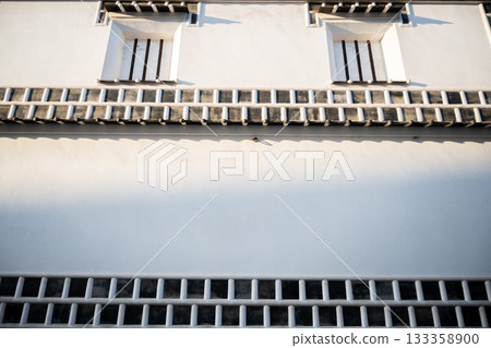 A walk through the Bikan Historical Quarter, a popular tourist destination in Kurashiki City, Okayama Prefecture, under the clear skies of the early morning sun 133358900