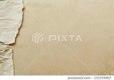 A small piece of torn paper is lying on a patch of sand nearby. AI-generated content. 133359907