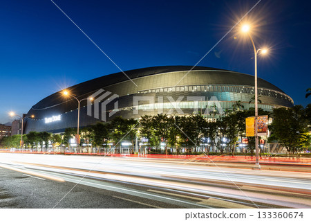 Night view of the Taipei Dome in Taiwan, also known as the Farglory Dome, is a multi-purpose domed stadium. 133360674