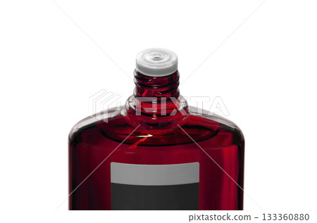 [Cutout transparent background material] Red translucent bottle of hair growth agent with screw cap open 133360880