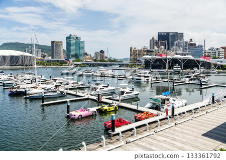 View of Argo Yacht Marina at Glory Pier of Kaohsiung Port, Taiwan, and the Kaohsiung Music Center building. View of Argo Yacht Marina at Glory Pier of Kaohsiung Port, Taiwan, and the Kaohsiung Music Center building. 133361792