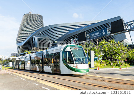 The circular light rail train drives past the Kaohsiung Port Cruise Terminal station in Taiwan. 133361951