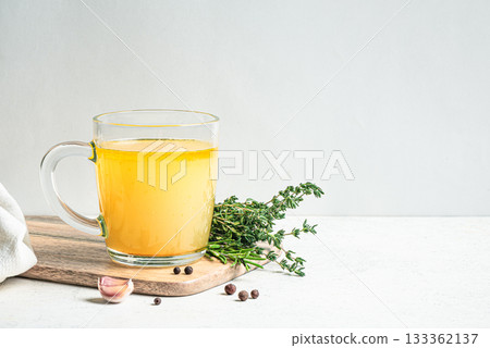 Beef bone broth with herbs 133362137