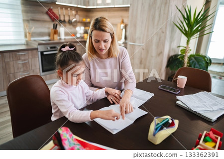 Engaging in creative learning at home with mother and daughter Engaging in creative learning at home with mother and daughter 133362391