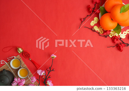Chinese New Year festive arrangement with oranges and tea Chinese New Year festive arrangement with oranges and tea 133363216