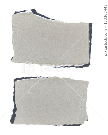 Brown kraft paper torn into pieces isolated on white background 133363445