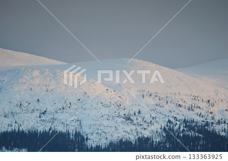 Landscape, mountains in winter under a layer of snow close-up 133363925